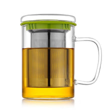 Load image into Gallery viewer, Clear glass mug with green lid filled with tea on a white background