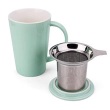 Load image into Gallery viewer, Mint green mug with a metal tea infuser on a white background