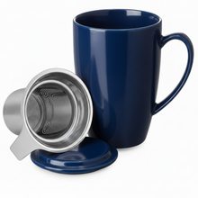 Load image into Gallery viewer, Blue mug with a metal tea infuser on a white background

